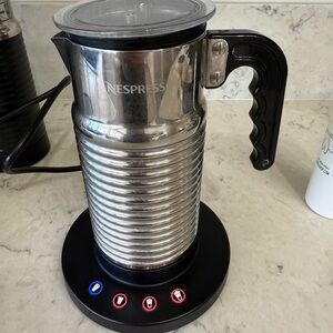 Nespresso Silver Milk Frother with Black Handle